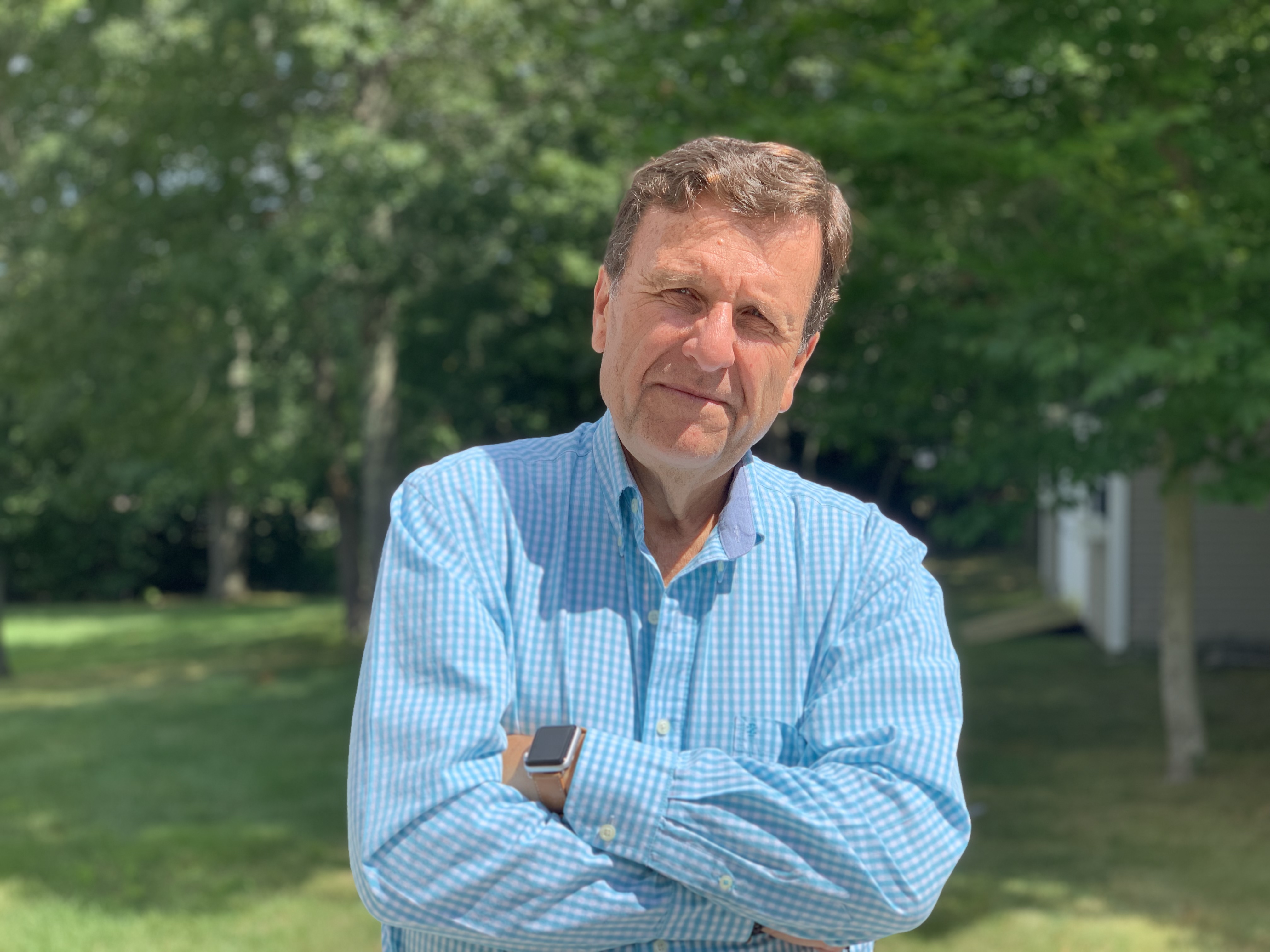 Dr. Boulanger standing on patio