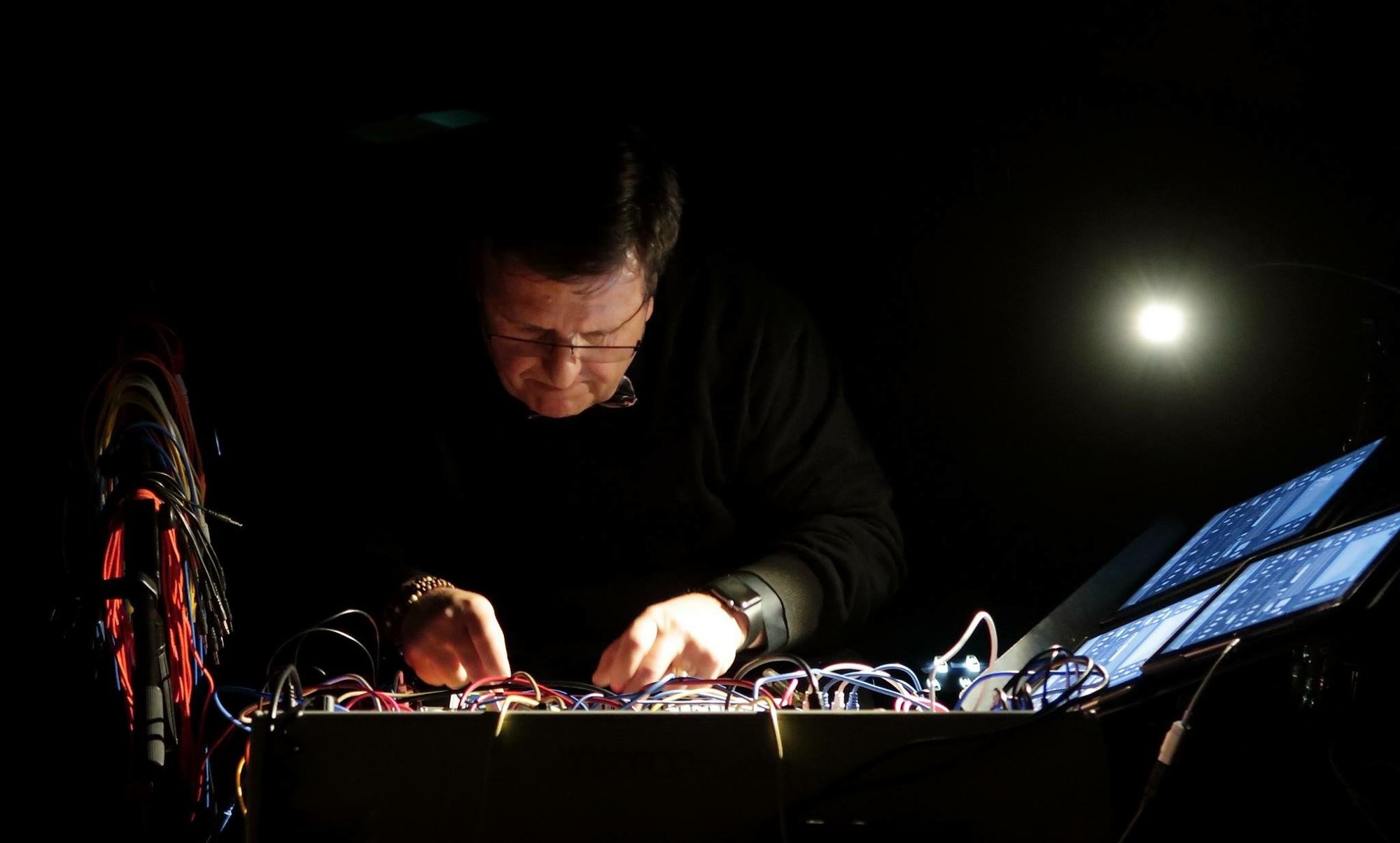 Dr. Boulanger performing in dark with modular