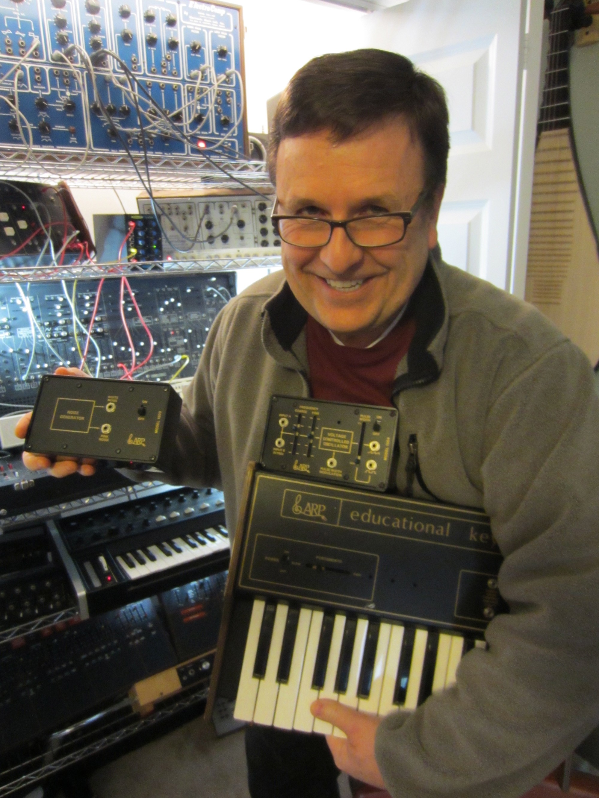 Dr. Boulanger holding ARP Educational Keyboard