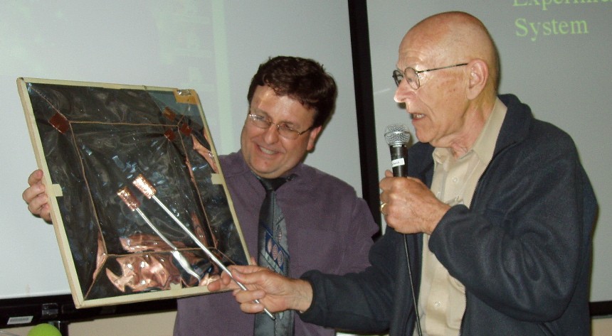 Boulanger and Mathews holding the Radio Baton prototype