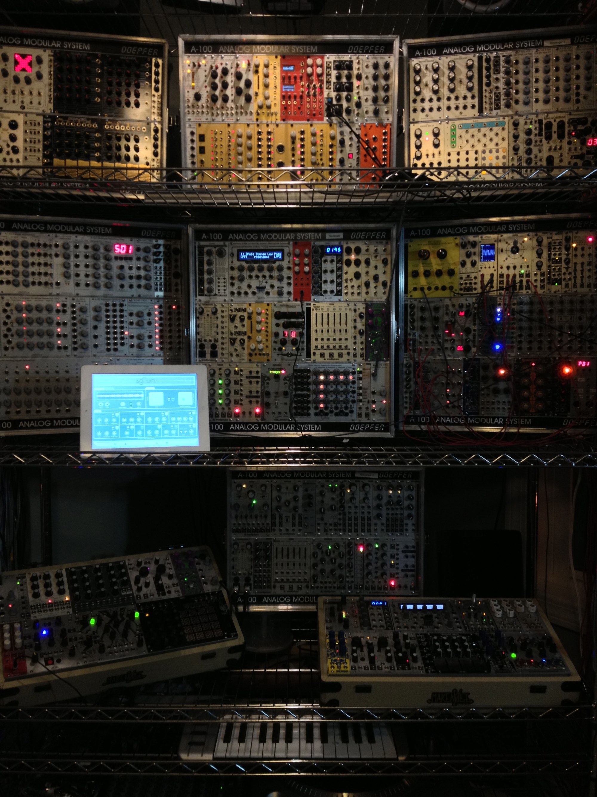 Modular rack in the dark with lights glowing